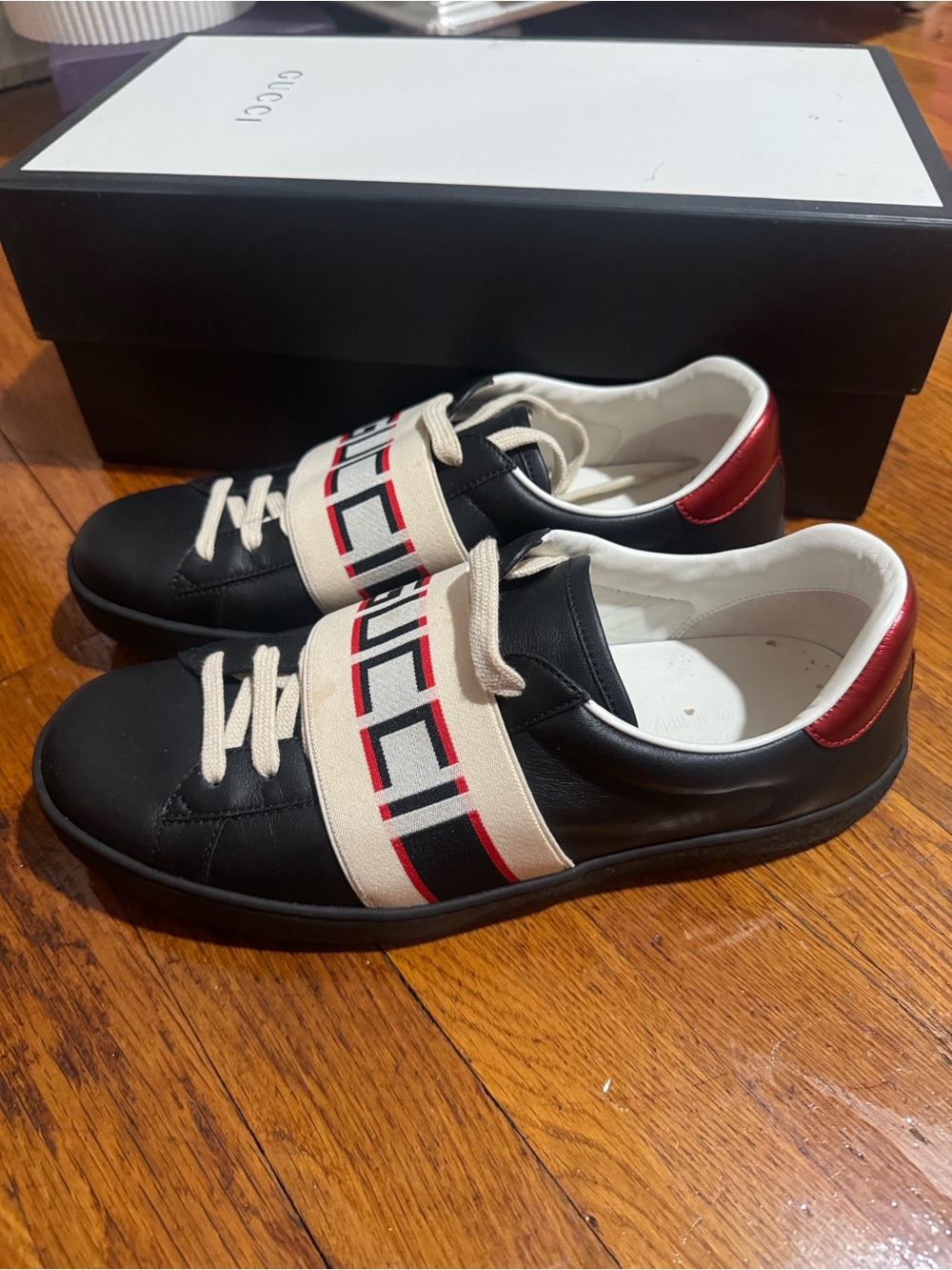 Gucci Men’s Black Leather Low-Top Sneaker with Red Accent and Logo Strap